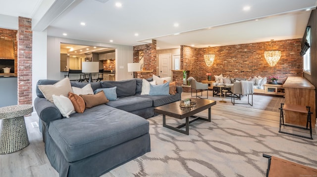 31 Westcliff Dr, West Hartford, CT 06117 - living area featuring brick wall, light wood-style floors, and recessed lighting