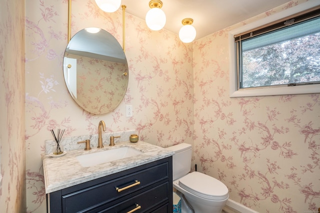 31 Westcliff Dr, West Hartford, CT 06117 - bathroom featuring toilet, wallpapered walls, and vanity