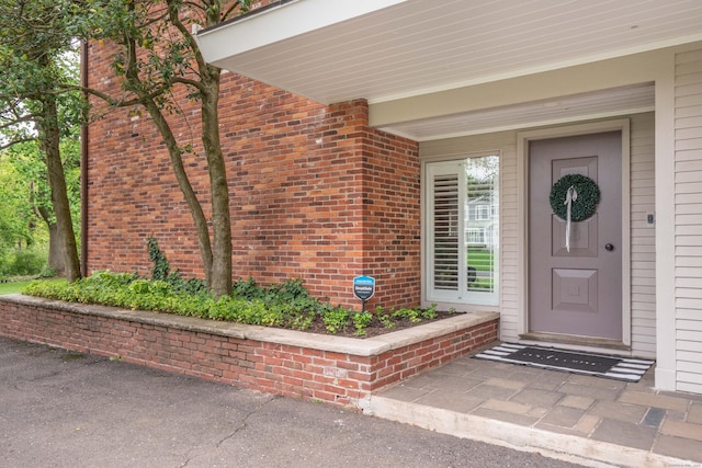 31 Westcliff Dr, West Hartford, CT 06117 - view of exterior entry featuring brick siding