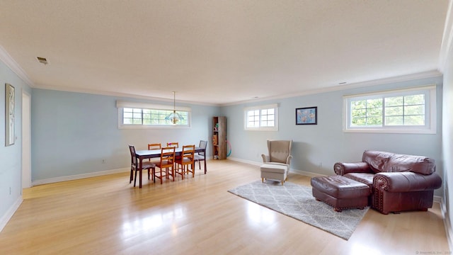 500 Prospect St Apt 4B, New Haven, CT 06511 - dining area with crown molding, light wood-style floors, and baseboards