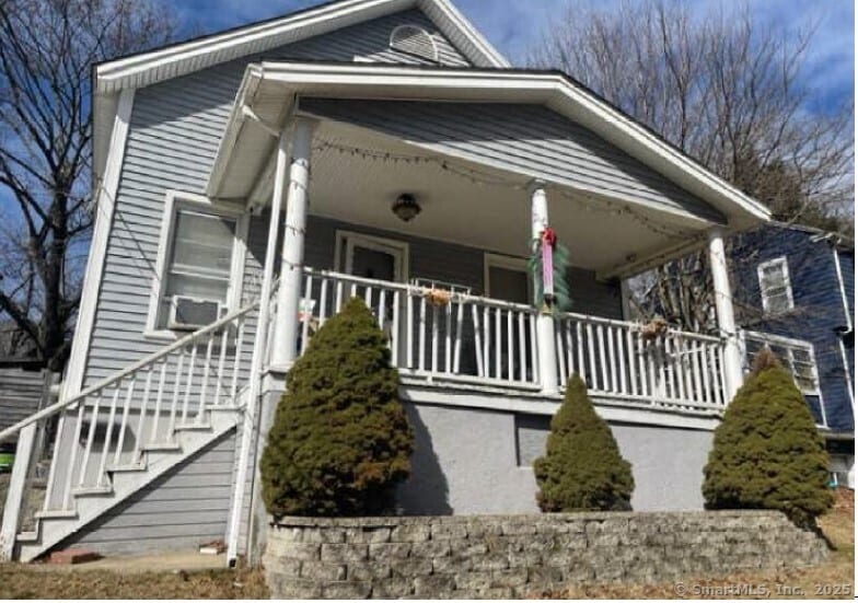 597 Cooke St, Waterbury, CT 06710 - view of front of home featuring covered porch and stairs