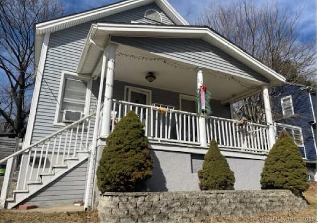 597 Cooke St, Waterbury, CT 06710 - view of front of home featuring covered porch and stairs