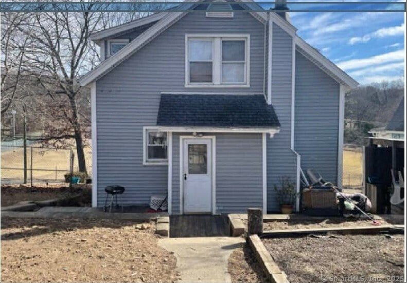 597 Cooke St, Waterbury, CT 06710 - rear view of house with a shingled roof