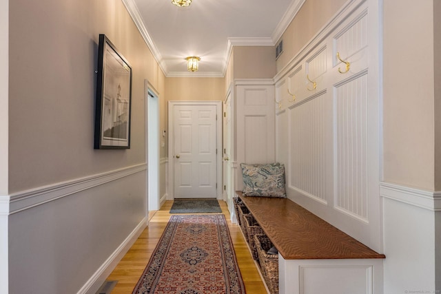 188 Bartlett Dr, Madison, CT 06443 - mudroom featuring light wood-style flooring, crown molding, and baseboards