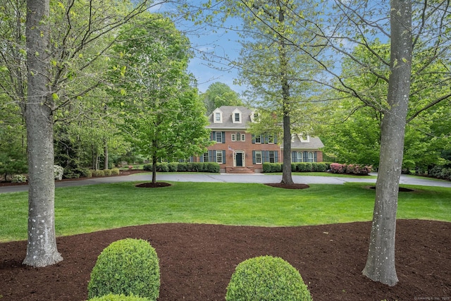 188 Bartlett Dr, Madison, CT 06443 - view of front of property featuring brick siding and a front lawn