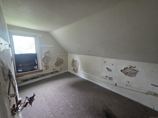 42 Spring St, New London, CT 06320 - additional living space with a textured ceiling and vaulted ceiling