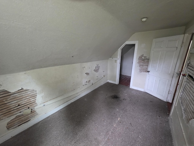 42 Spring St, New London, CT 06320 - bonus room featuring lofted ceiling, baseboards, and a textured ceiling