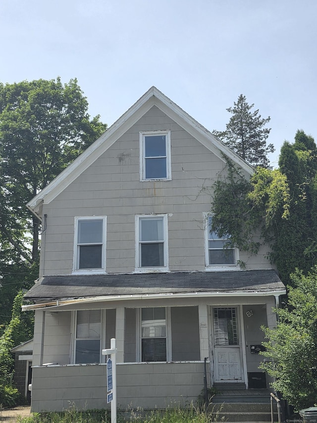 42 Spring St, New London, CT 06320 - traditional style home with covered porch and a shingled roof