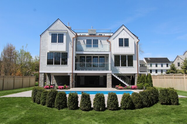22 Apple Tree Trl, Westport, CT 06880 - rear view of property with stairway, board and batten siding, and a sunroom