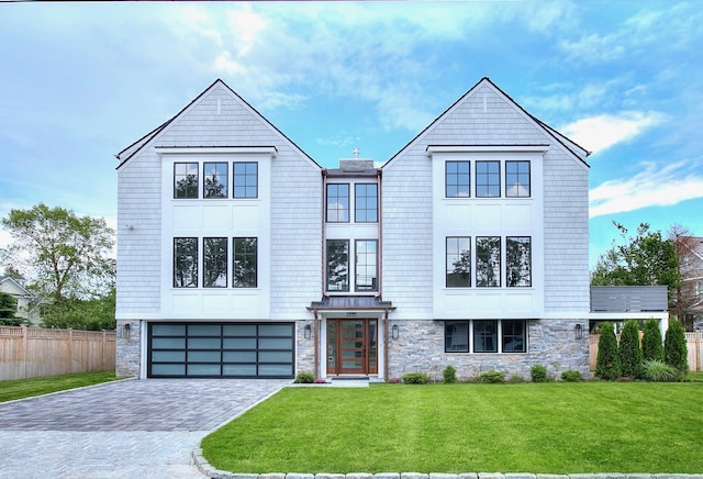 22 Apple Tree Trl, Westport, CT 06880 - view of front facade featuring stone siding, an attached garage, and decorative driveway
