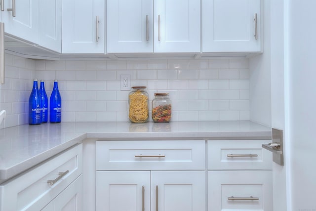 22 Apple Tree Trl, Westport, CT 06880 - kitchen featuring white cabinets, decorative backsplash, and light countertops