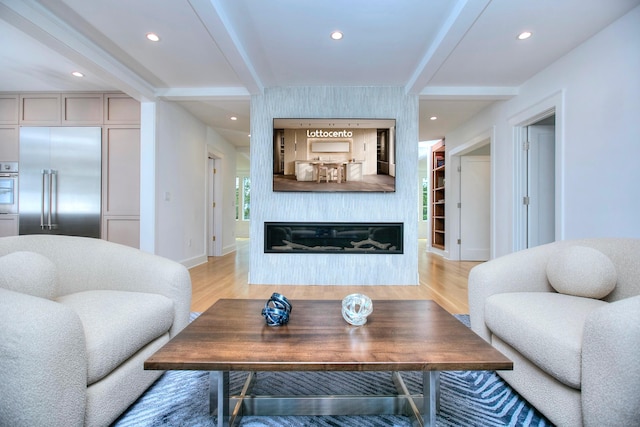 22 Apple Tree Trl, Westport, CT 06880 - living room featuring beam ceiling, light wood-type flooring, a large fireplace, and recessed lighting