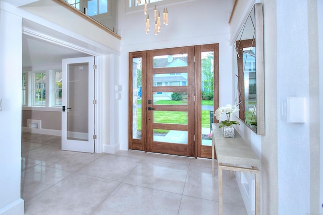 22 Apple Tree Trl, Westport, CT 06880 - tiled entrance foyer featuring baseboards and a chandelier