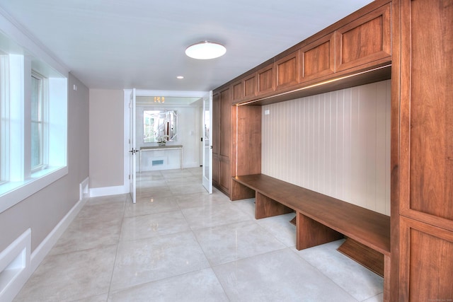22 Apple Tree Trl, Westport, CT 06880 - mudroom with light tile patterned floors and baseboards
