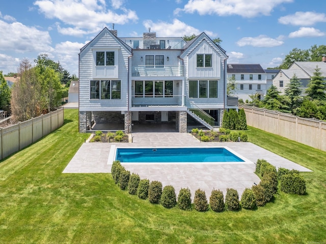 22 Apple Tree Trl, Westport, CT 06880 - rear view of property featuring stairway, a balcony, a patio area, a fenced backyard, and board and batten siding