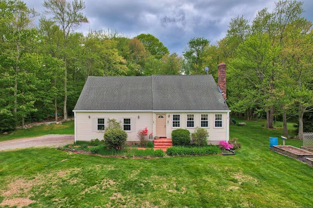 40 Fountainhead Rd, Plymouth, CT 06786 - cape cod home with a front yard, a chimney, and driveway
