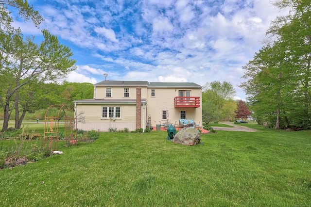 40 Fountainhead Rd, Plymouth, CT 06786 - rear view of property featuring a lawn and a balcony