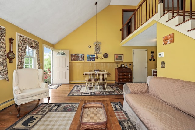 40 Fountainhead Rd, Plymouth, CT 06786 - living area featuring wood finished floors, high vaulted ceiling, wainscoting, and stairway