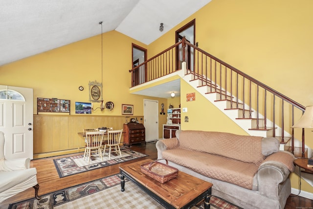 40 Fountainhead Rd, Plymouth, CT 06786 - living area featuring stairs, wood finished floors, a baseboard heating unit, and high vaulted ceiling