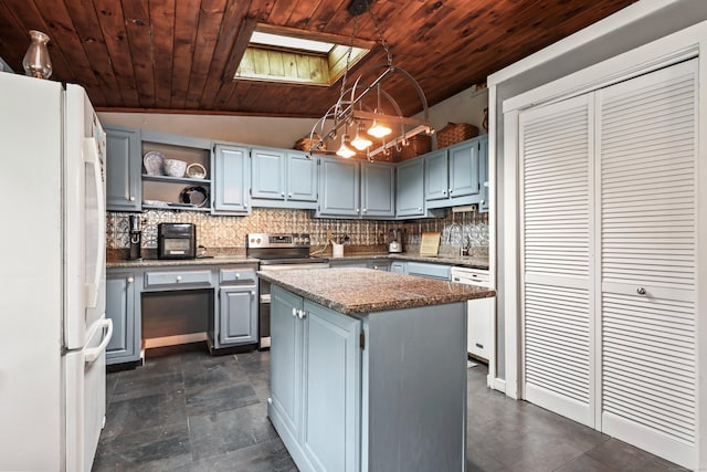 40 Fountainhead Rd, Plymouth, CT 06786 - kitchen with white appliances, wooden ceiling, lofted ceiling, a skylight, and a kitchen island
