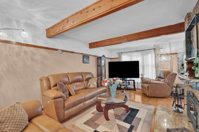 41 Farm Dr Unit 41, Farmington, CT 06032 - living room with light wood-style flooring and beamed ceiling