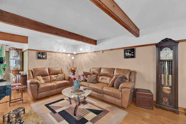 41 Farm Dr Unit 41, Farmington, CT 06032 - living area featuring wood finished floors and beam ceiling