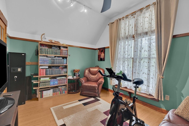 41 Farm Dr Unit 41, Farmington, CT 06032 - workout area with track lighting, wood finished floors, vaulted ceiling, and ceiling fan