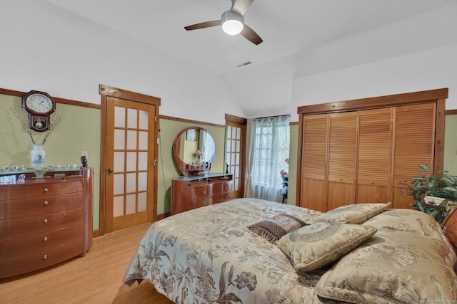 41 Farm Dr Unit 41, Farmington, CT 06032 - bedroom featuring light wood finished floors, vaulted ceiling, a closet, and ceiling fan