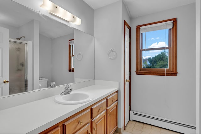 136 Windmill Hl, Wethersfield, CT 06109 - bathroom featuring a baseboard heating unit, a stall shower, vanity, toilet, and tile patterned floors