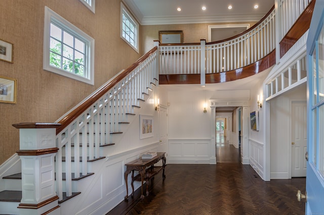 67 Peaceable St, Ridgefield, CT 06877 - staircase featuring a high ceiling, recessed lighting, crown molding, baseboards, and wallpapered walls