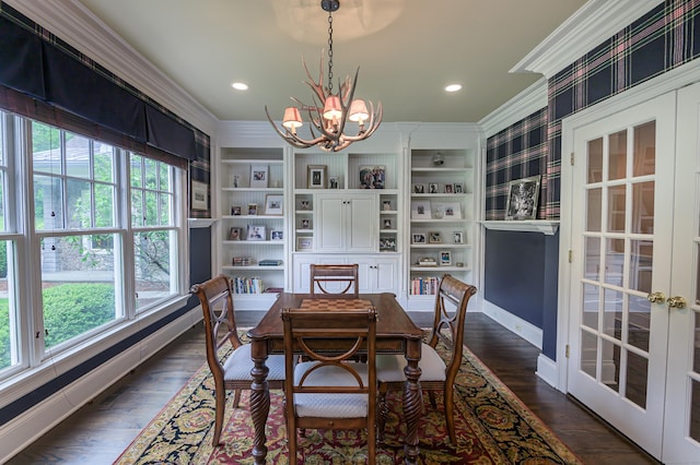 67 Peaceable St, Ridgefield, CT 06877 - dining space featuring crown molding, a chandelier, baseboards, dark wood finished floors, and wallpapered walls