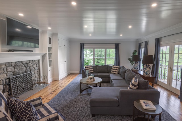 67 Peaceable St, Ridgefield, CT 06877 - living area featuring plenty of natural light, light wood finished floors, crown molding, recessed lighting, and baseboards