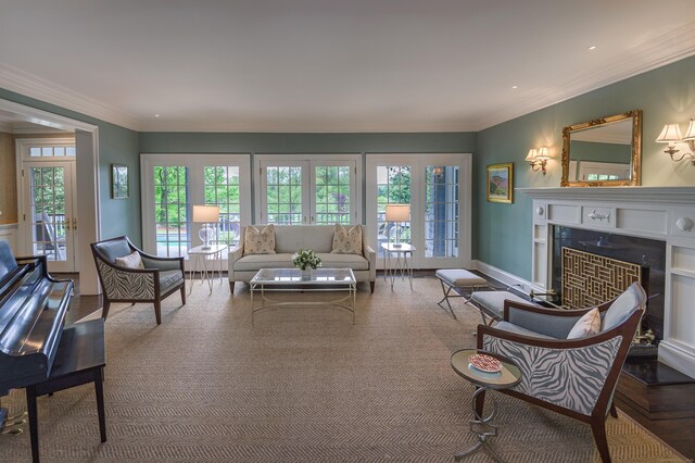 67 Peaceable St, Ridgefield, CT 06877 - living area featuring a fireplace, healthy amount of natural light, and ornamental molding