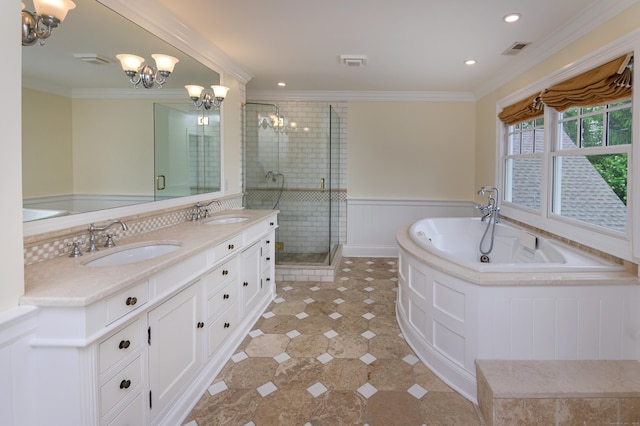 67 Peaceable St, Ridgefield, CT 06877 - bathroom featuring a chandelier, crown molding, a stall shower, a wainscoted wall, and a bath