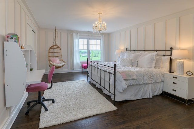 67 Peaceable St, Ridgefield, CT 06877 - bedroom with a chandelier, dark wood finished floors, and baseboards