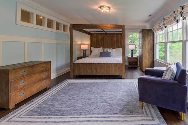 67 Peaceable St, Ridgefield, CT 06877 - bedroom with wood finished floors, a decorative wall, and ornamental molding