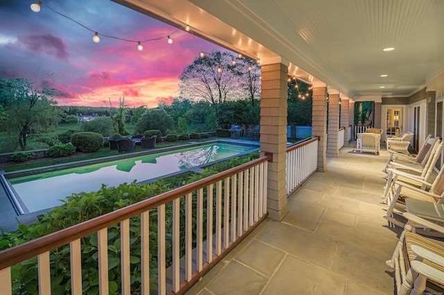 67 Peaceable St, Ridgefield, CT 06877 - patio terrace at dusk featuring an outdoor pool