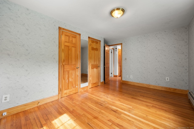 717 Center St, Manchester, CT 06040 - empty room with light wood finished floors and baseboards