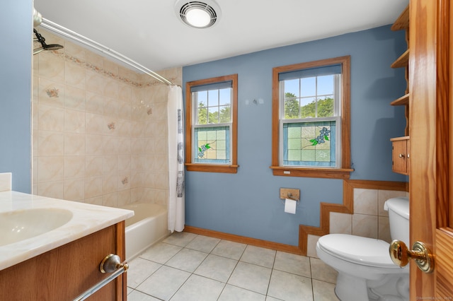 717 Center St, Manchester, CT 06040 - bathroom featuring toilet, tile patterned flooring, vanity, and shower / bath combination with curtain