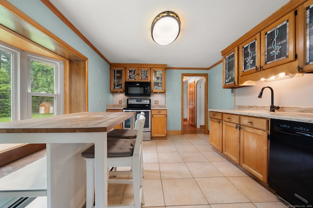 717 Center St, Manchester, CT 06040 - kitchen with black appliances, crown molding, wooden counters, light tile patterned floors, and glass insert cabinets
