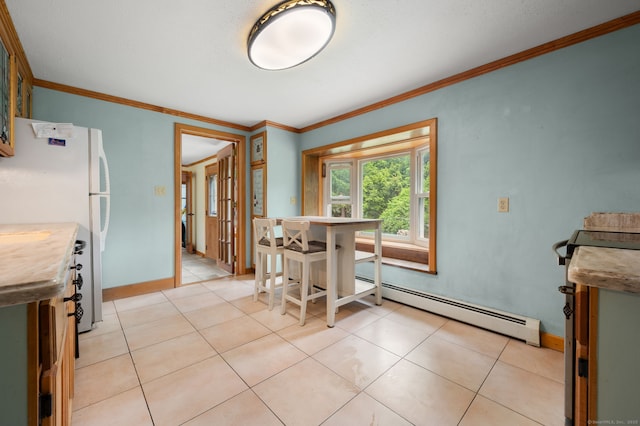 717 Center St, Manchester, CT 06040 - dining space featuring ornamental molding, baseboards, light tile patterned floors, and a baseboard heating unit