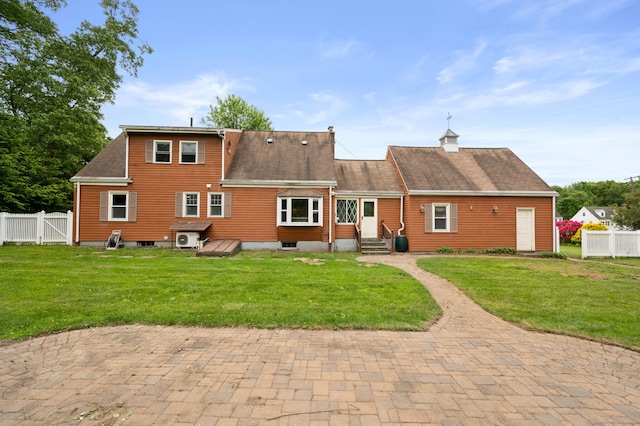 717 Center St, Manchester, CT 06040 - back of property with entry steps, a shingled roof, and a gate