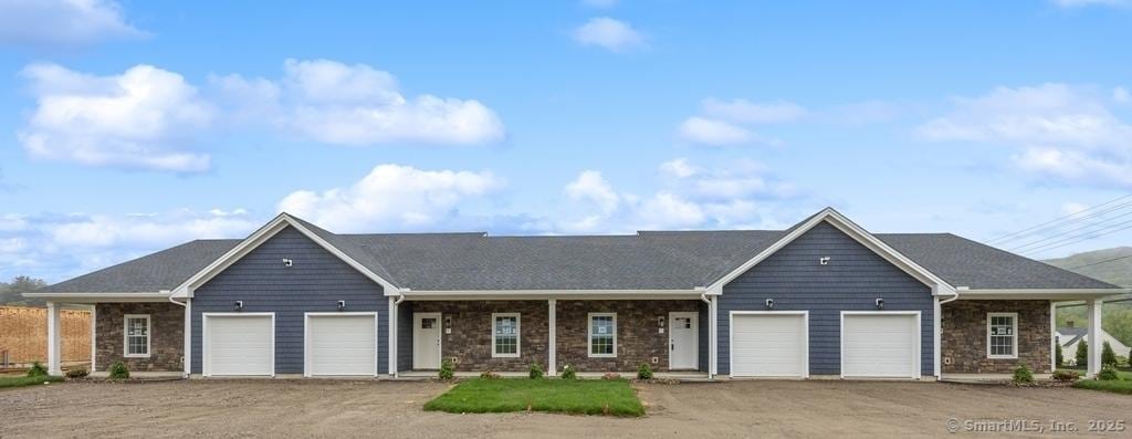 210 Munson Rd Unit 3-A, Wolcott, CT 06716 - single story home with an attached garage, stone siding, and covered porch