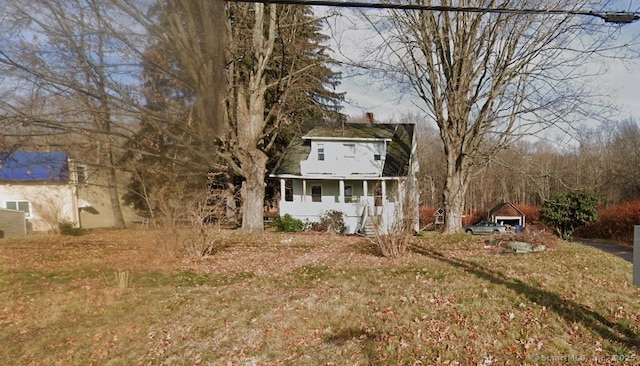 827 Middle Tpke E, Manchester, CT 06040 - view of front of house with a porch and a chimney