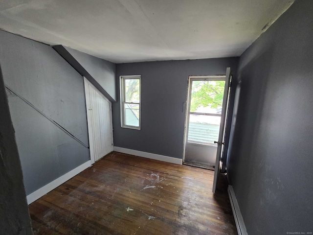 827 Middle Tpke E, Manchester, CT 06040 - spare room with wood-type flooring, a baseboard heating unit, and baseboards