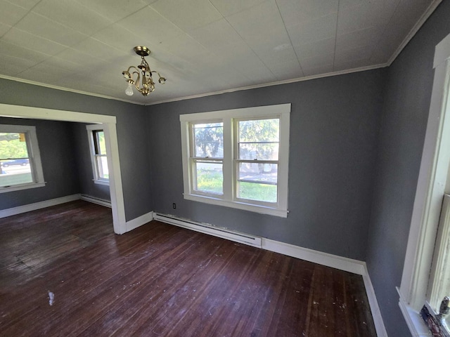 827 Middle Tpke E, Manchester, CT 06040 - spare room with a baseboard heating unit, dark wood-type flooring, ornamental molding, and healthy amount of natural light