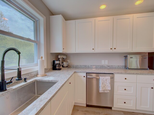 1026 Rte 171, Woodstock, CT 06281 - kitchen with stainless steel dishwasher, a sink, healthy amount of natural light, white cabinetry, and recessed lighting