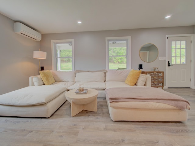 1026 Rte 171, Woodstock, CT 06281 - living area featuring an AC wall unit, healthy amount of natural light, light wood-style floors, and recessed lighting