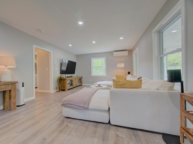 1026 Rte 171, Woodstock, CT 06281 - living room featuring a wall mounted air conditioner, wood finished floors, recessed lighting, and baseboards