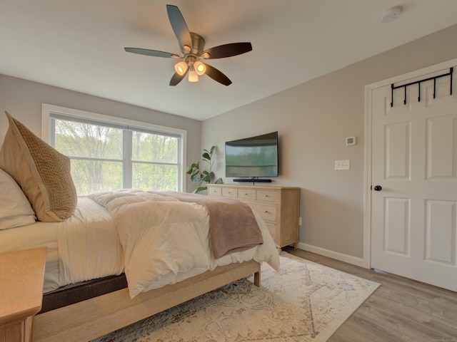 1026 Rte 171, Woodstock, CT 06281 - bedroom with light wood finished floors, baseboards, and ceiling fan